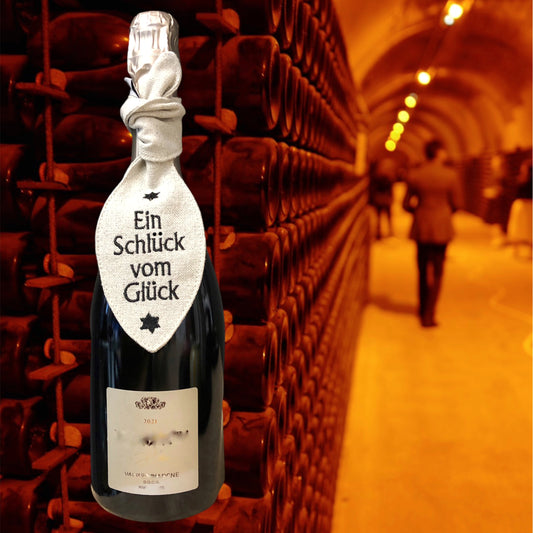 Bestickte Schleife mit Botschaft