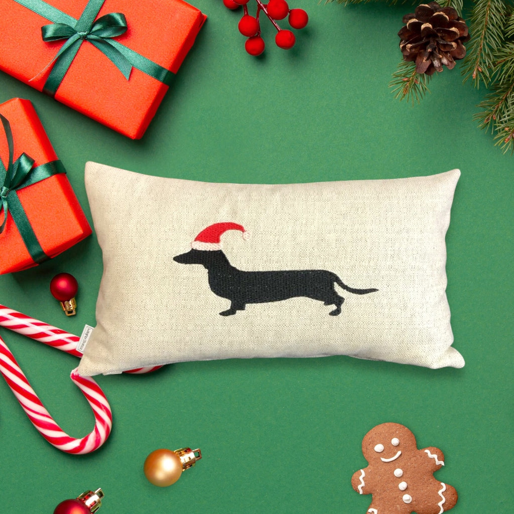 Weihnachtlich bestickte Kissen