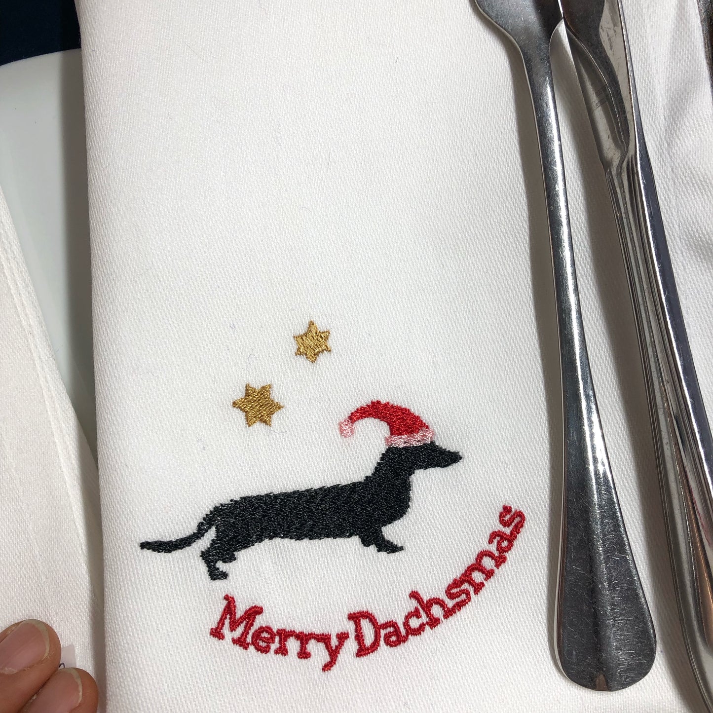 Serviette mit Stickerei für die  Weihnachtstafel