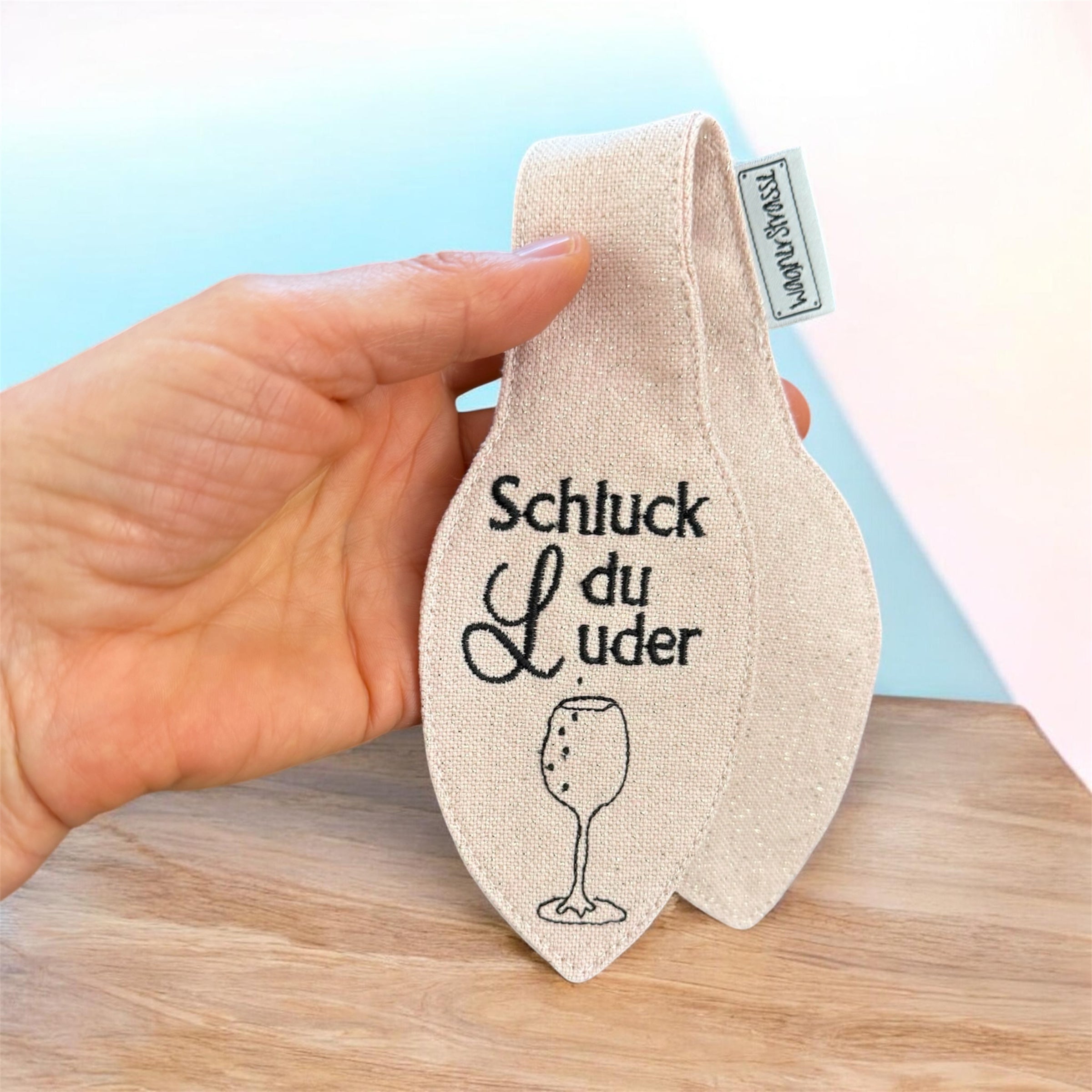 Bestickte Schleife mit  Botschaft