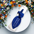 Schleife mit Mehlsack Stickerei